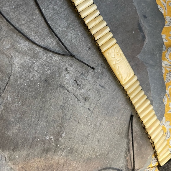 Beautiful simulated bone choker necklace with elephant engraved ties at back - Picture 6 of 8